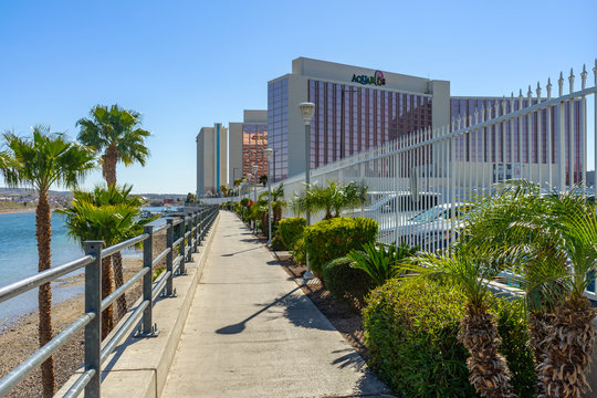 Laughlin, NV / USA &ndash; February 19, 2020: Walking path along the Colorado River to the Aquarius Hotel and Casino in Laughlin, Nevada.