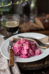 Homemade Beet and Potato Salad Served with Salted Herring Fillet