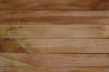 Background from wooden wet boards top view. Wooden background from horizontally folded planks. Rough wood texture