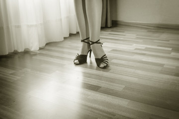 Woman feet in dance position
