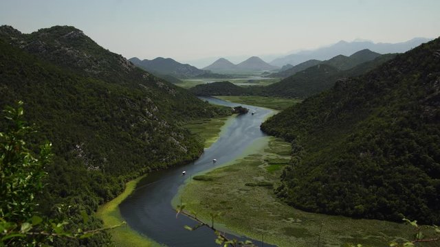 Montenegro, panorama of crnojevica river water bend at pavlova strana, valley in national park skadar lake. Nature landscape, summer tourism & family travel destination in Balkans Europe.