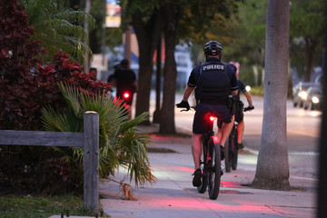 police officers riding bikes