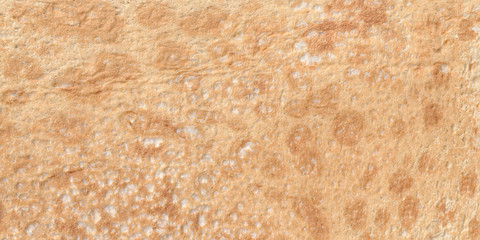 Texture of thin traditional freshly baked homemade italian bread. Close-up pita bread as a textured bread background.
