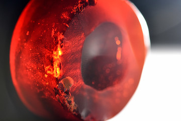 Amber red rosin isolated closeup macro