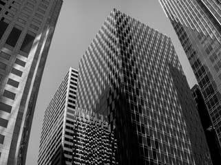 Low angle shot of a modern building with glass panels at the financial district of San Francisco