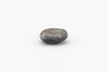Black magnetic Atacaimite Tektite Meteorite isolated, a rock formed in a big meteorite collision at...