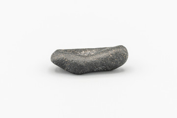 Black magnetic Atacaimite Tektite Meteorite isolated, a rock formed in a big meteorite collision at...