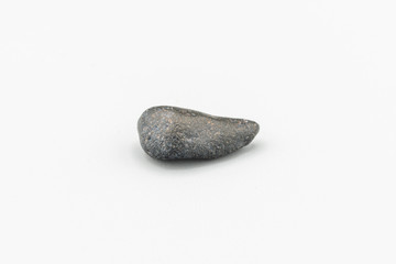 Black magnetic Atacaimite Tektite Meteorite isolated, a rock formed in a big meteorite collision at...