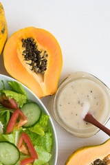 Papaya Seed Dressing and a bowl of salad
