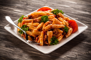 Pasta with meat, tomato sauce and vegetables