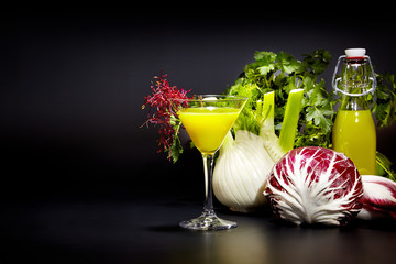 Glasses with fresh vegetable juices isolated on black. Detox diet.