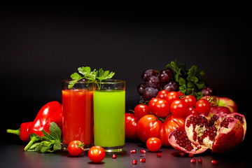 Glasses with fresh vegetable juices isolated on black. Detox