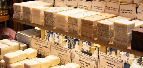 Solid soaps in different colors and flavors close-up.