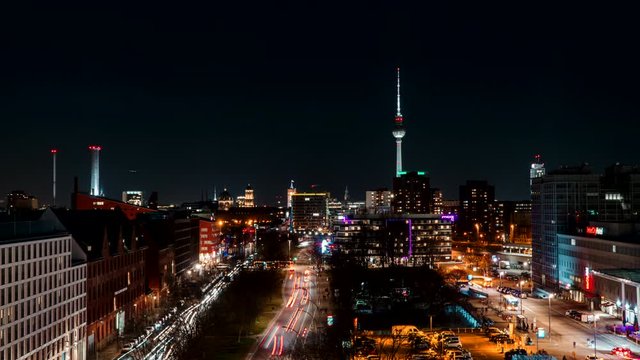 Timelapse of Berlin city panorama during the night as the traffic passes by