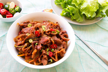 Stir fried with pork and vegetables sprinkle sesame seeds