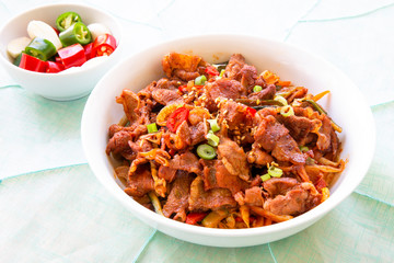 Stir fried with pork and vegetables sprinkle sesame seeds