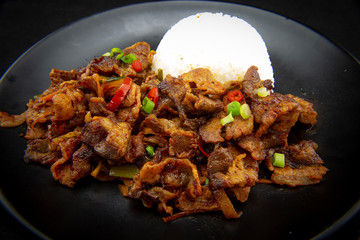 Stir fried with pork and vegetables sprinkle sesame seeds