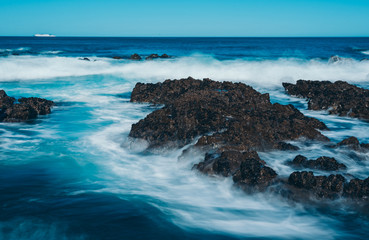 Long Exposure Of Sea Wave with rock