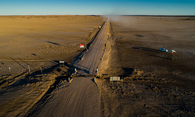 The SA/QLD border at sunset on the Birdsville Track