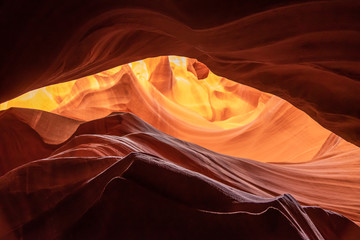 Unique & stunning Antelope Canyon located near Page, Arizona. Looking up into the famous tourist...