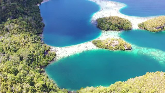 A maze of limestone islands is found in Raja Ampat's beautiful seascape. This area in Indonesia is known to be the heart of marine biodiversity and is a popular destination for divers and snorkelers.