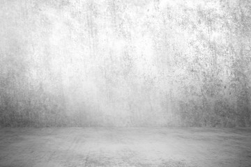 Empty room with white wall and concrete floor