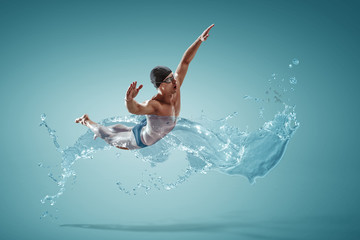 Obraz na płótnie Canvas Professional man swimmer on a wave