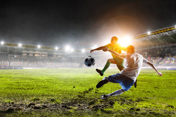 Obraz na płótnie Canvas Black man plays his best soccer match. Mixed media