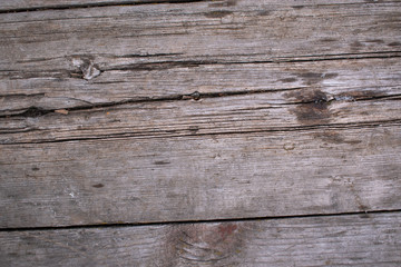 Old wooden boards for the background. Diagonal cracks, joint.