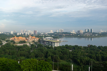 Fototapeta na wymiar Beautiful scenery Putrajaya city surrounding by lake over cloudy sky background