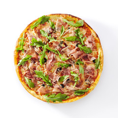 Pizza with Dried Tomatoes, Capers, Prosciutto, Arugula and Mozzarella
