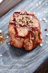Filet mignon steak with salt and spices