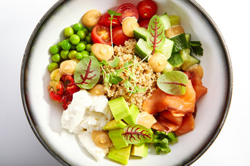 Couscous with salmon and fresh vegetables