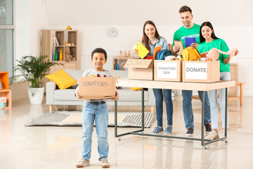 Volunteers with donations at orphan home