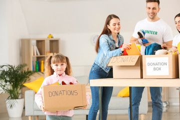 Volunteers with donations at orphan home