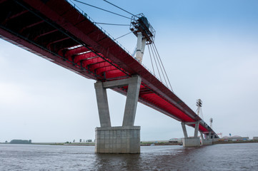 Russia, Blagoveshchensk, July 2019: Bridge on the Amur river from Blagoveshchensk to the Chinese city of Heihe in summer