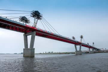 Russia, Blagoveshchensk, July 2019: Bridge on the Amur river from Blagoveshchensk to the Chinese city of Heihe in summer