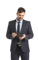 Businessman with purse on white background