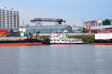 Russia, Blagoveshchensk, July 2019: River station, cranes for loading operations, Blagoveshchensk in summer