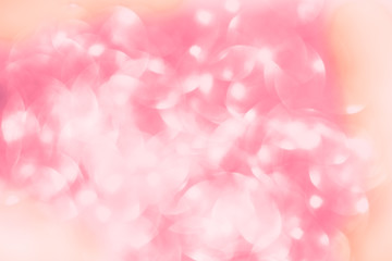 Shimmering blur spot light on pink cherry color background, Christmas concept