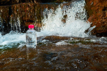 Plastic bottle with drinking water.
