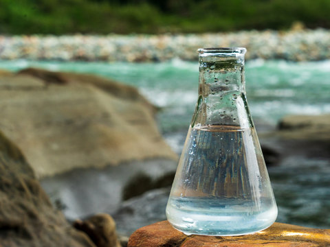 Glass flask with clean drinking water.