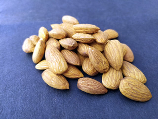 fresh healthy almonds isolated on seamless background