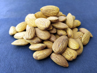fresh healthy almonds isolated on seamless background