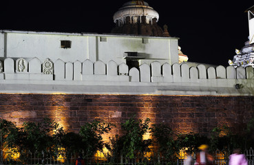 Sri jagannath temple boundry wall at night with colorful yellow