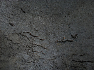 cracked cement covered with gray cement surface as background for design