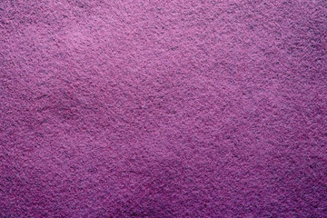 Purple felt soft rough textile material background texture close up. Colorful felt texture for background with copy space. Felt fabric sheet