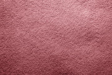 Abstract background with brown texture, velvet fabric, close-up. Colorful felt texture for background with copy space. Felt fabric sheet