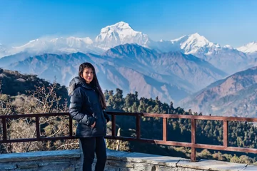 Papier peint photo autocollant rond Dhaulagiri Beautiful girl posing infront of Dhaulagiri mountain range, Pokhara, Nepal