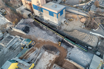 Precast concrete plant. A platform for unloading inert materials from freight railway cars. Crushed stone unloading.